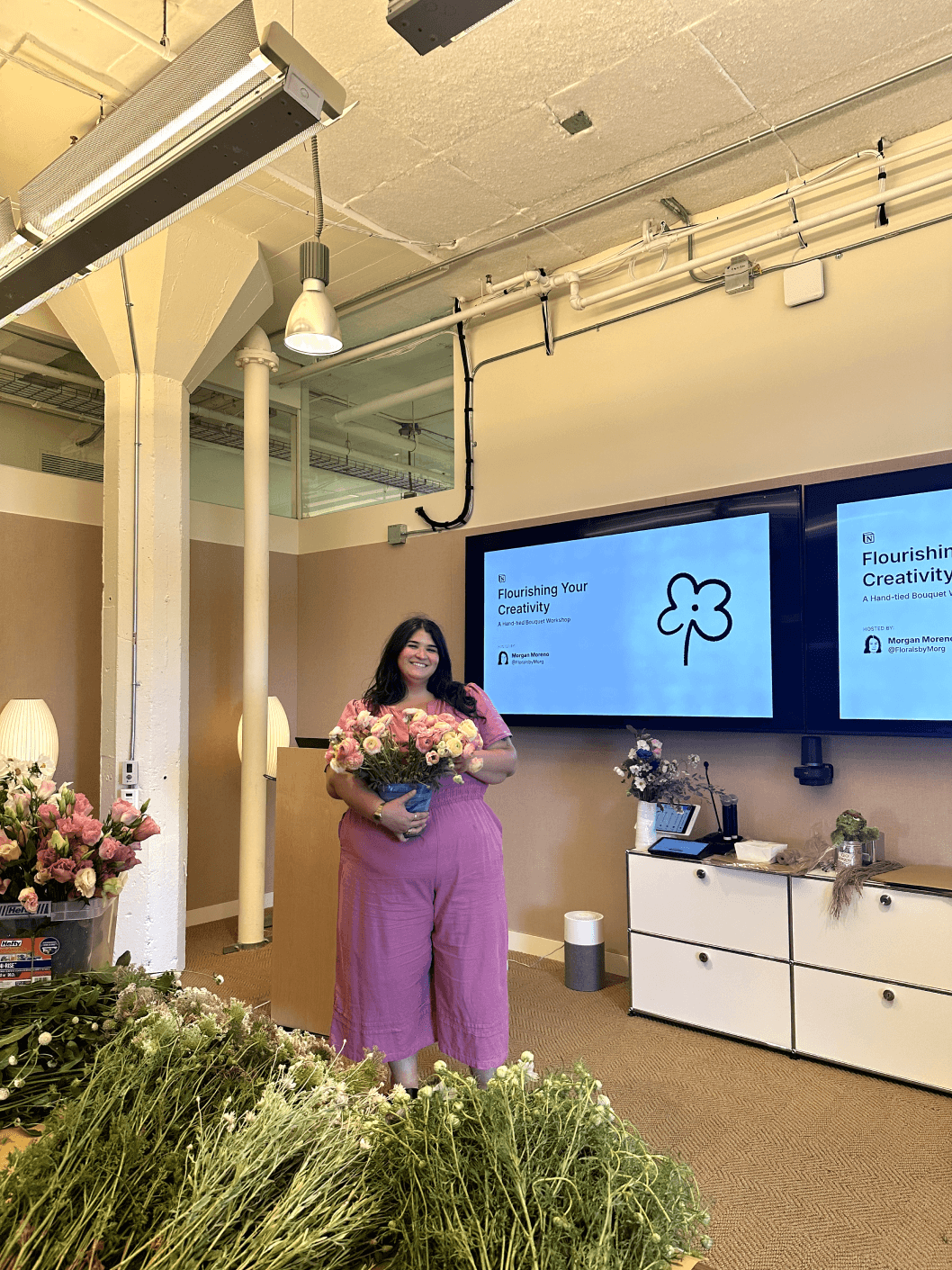 Morgan Moreno, Employer Branding Program Manager, leading a session on floral design