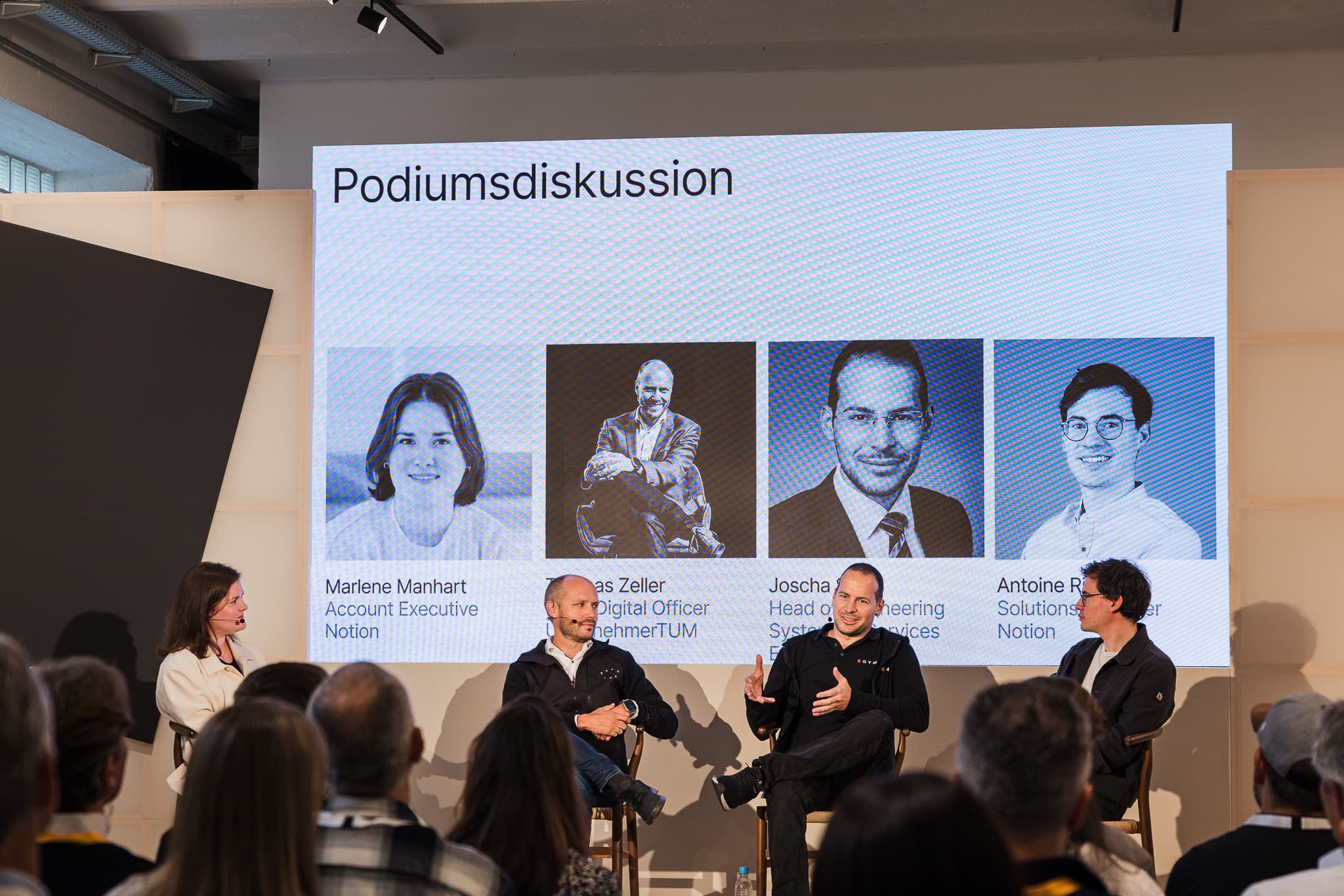 Joscha Storz from EGYM and Thomas Zeller from UnternehmerTUM sharing their thoughts on knowledge management and AI at Make with Notion Showcase Munich.